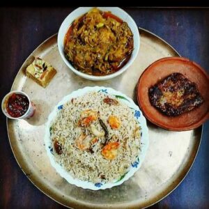 Samriddhi(Minimum Order Quantity=4) Fish Fry(kolkata Bhetki)(1 piece), Prawn Pulao, Handi Mutton (2 Pieces), Khajur-Amsatwo Chatni, Besan Ki Barfi(2 Pieces)
